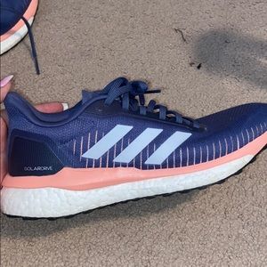 Size nine blue and pink adidas tennis shoes